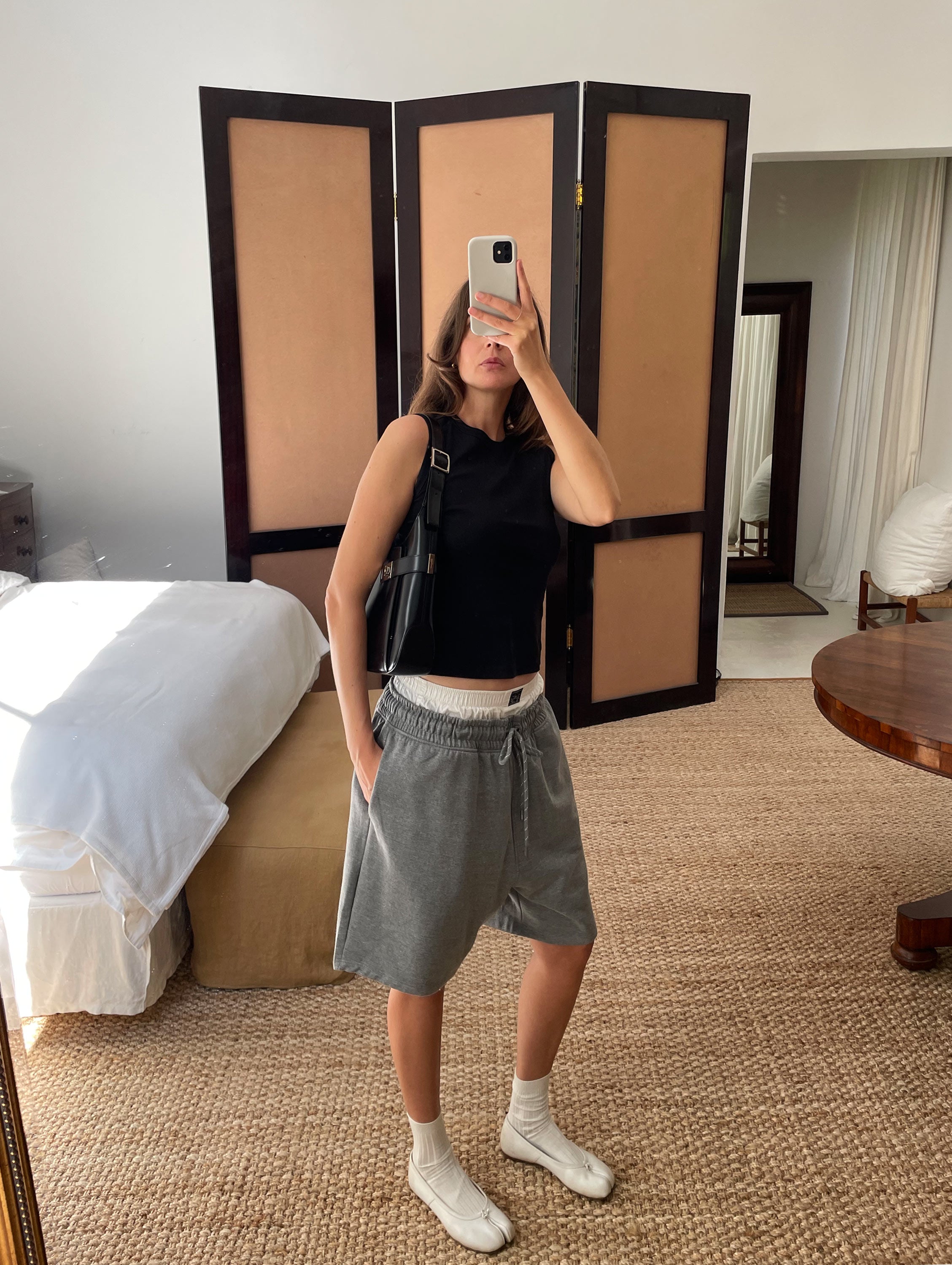 Charon in gray sweatshorts