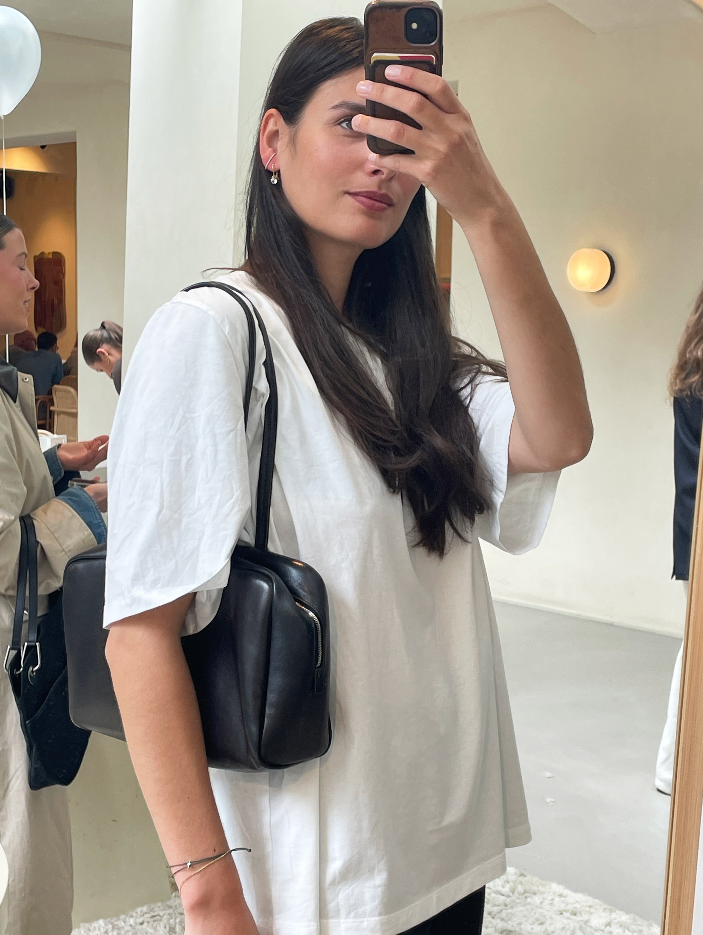 Lara with The Row Astra Bowling bag